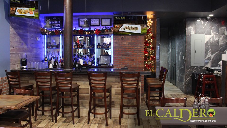 Front view of El Caldero on Jerome Avenue.