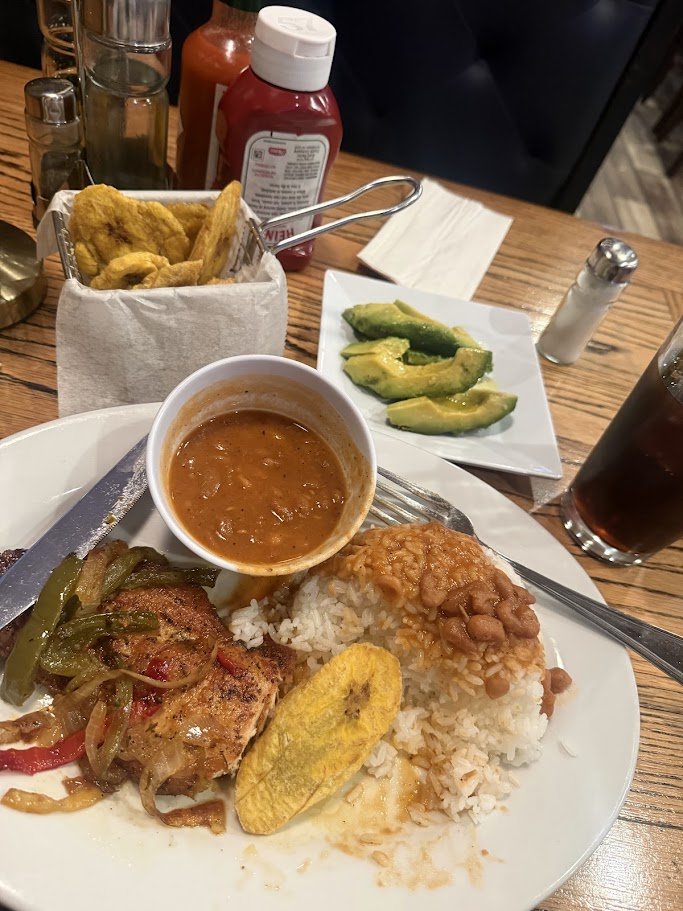 Dominican restaurant interior with simple seating.